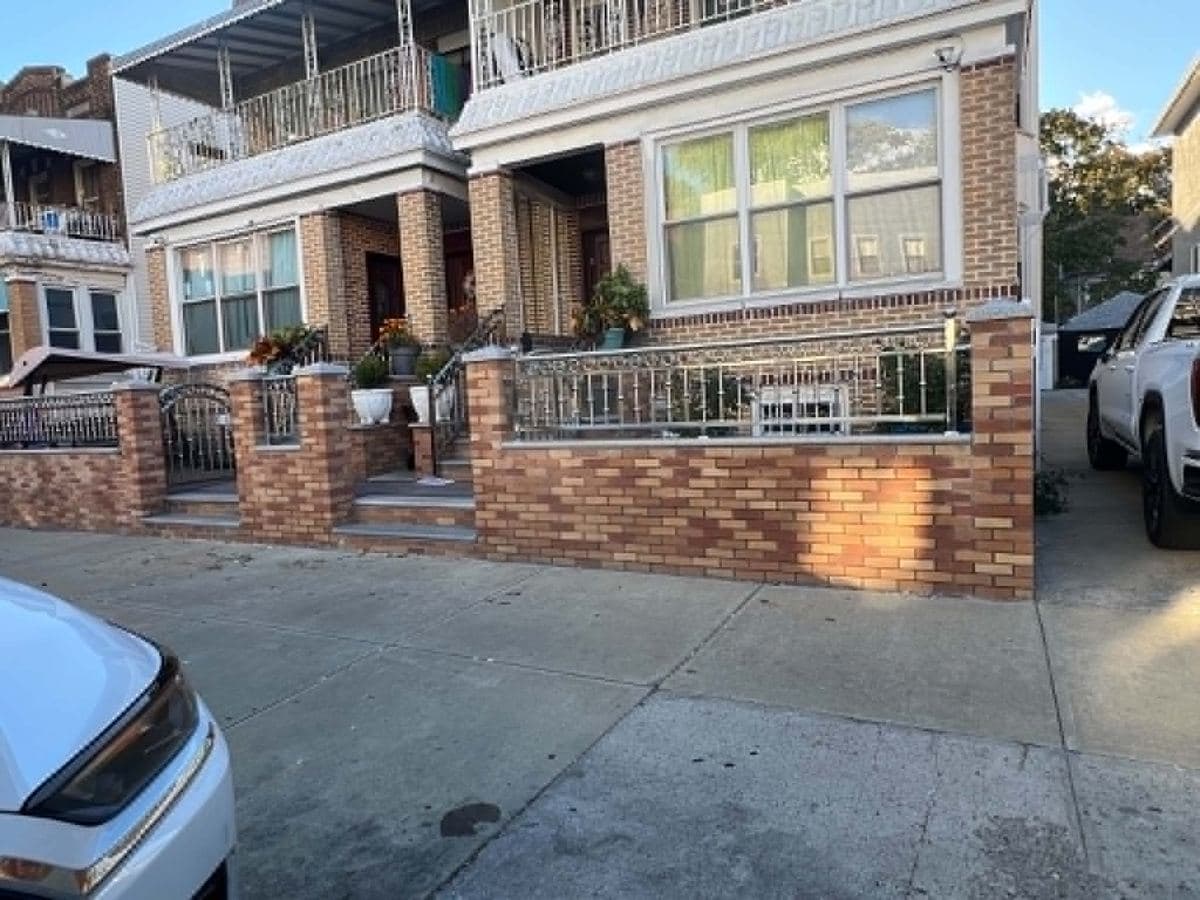 Residential brick frontages with completed masonry and porch details