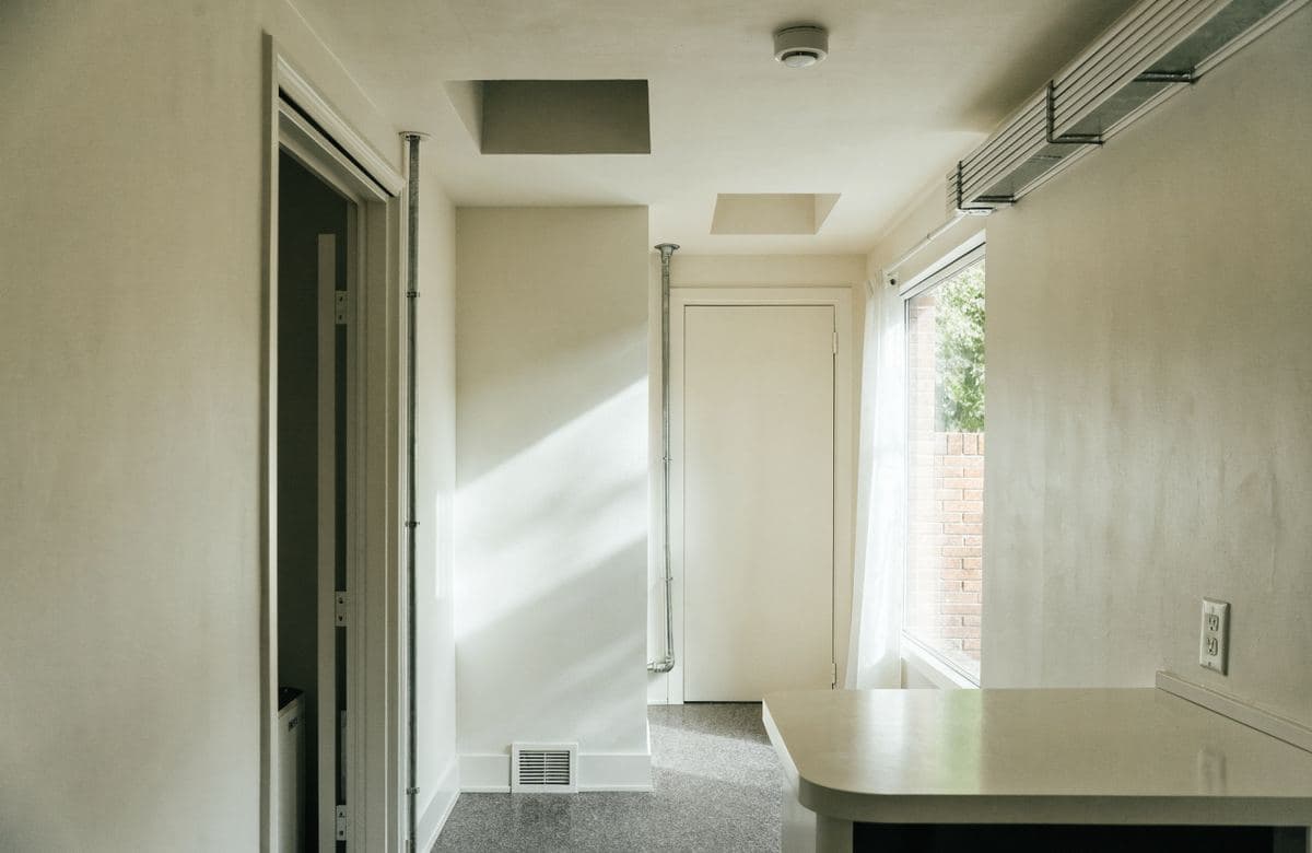 Illustrative freshly painted small commercial interior space