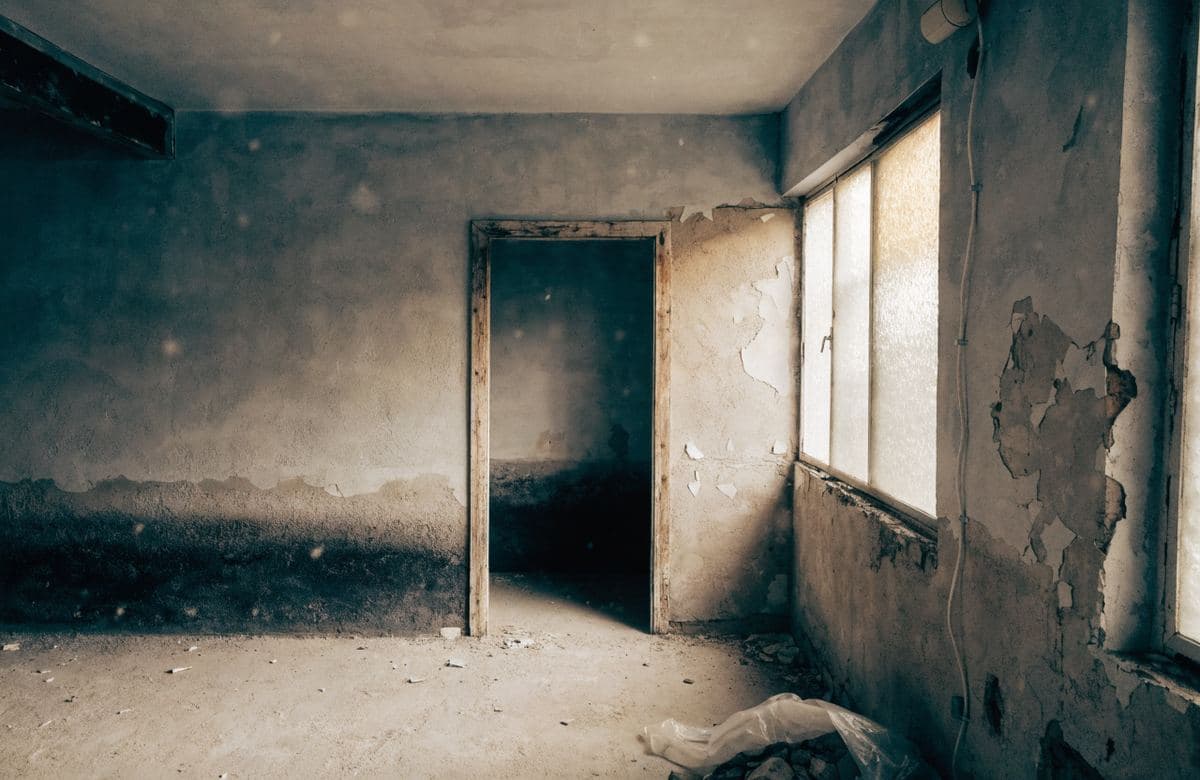 Illustrative worn, unfinished interior room with dull walls