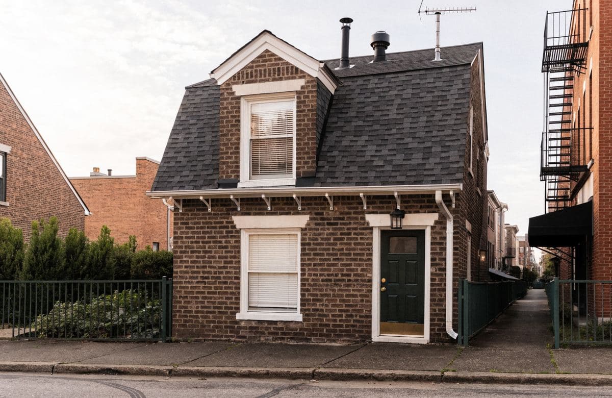 Illustrative single-family home with a maintained roof